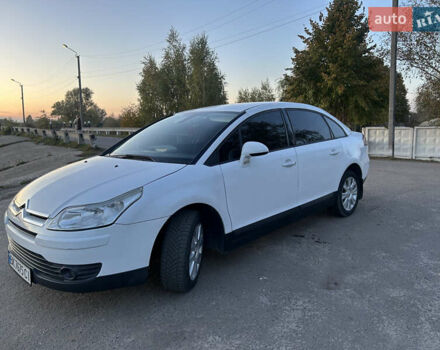 Белый Ситроен С4, объемом двигателя 1.6 л и пробегом 227 тыс. км за 4850 $, фото 1 на Automoto.ua