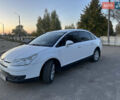 Белый Ситроен С4, объемом двигателя 1.6 л и пробегом 227 тыс. км за 4850 $, фото 1 на Automoto.ua