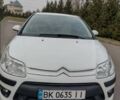 Белый Ситроен С4, объемом двигателя 1.6 л и пробегом 192 тыс. км за 4500 $, фото 1 на Automoto.ua