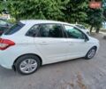 Белый Ситроен С4, объемом двигателя 1.6 л и пробегом 245 тыс. км за 7300 $, фото 1 на Automoto.ua