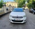 Белый Ситроен С4, объемом двигателя 1.6 л и пробегом 245 тыс. км за 7300 $, фото 1 на Automoto.ua