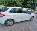 Білий Сітроен С4, об'ємом двигуна 1.6 л та пробігом 245 тис. км за 7500 $, фото 1 на Automoto.ua