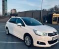 Белый Ситроен С4, объемом двигателя 1.6 л и пробегом 220 тыс. км за 7500 $, фото 1 на Automoto.ua
