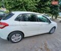 Белый Ситроен С4, объемом двигателя 1.6 л и пробегом 245 тыс. км за 7300 $, фото 1 на Automoto.ua