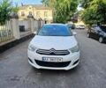 Белый Ситроен С4, объемом двигателя 1.6 л и пробегом 245 тыс. км за 7300 $, фото 1 на Automoto.ua