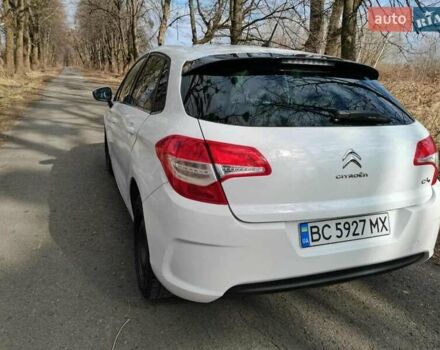 Белый Ситроен С4, объемом двигателя 1.6 л и пробегом 293 тыс. км за 5499 $, фото 1 на Automoto.ua