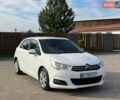 Белый Ситроен С4, объемом двигателя 1.6 л и пробегом 300 тыс. км за 4600 $, фото 1 на Automoto.ua