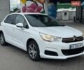 Белый Ситроен С4, объемом двигателя 1.6 л и пробегом 173 тыс. км за 5400 $, фото 1 на Automoto.ua