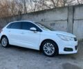 Белый Ситроен С4, объемом двигателя 1.6 л и пробегом 230 тыс. км за 7500 $, фото 1 на Automoto.ua