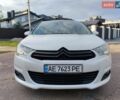 Белый Ситроен С4, объемом двигателя 1.6 л и пробегом 222 тыс. км за 5999 $, фото 1 на Automoto.ua