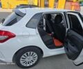 Белый Ситроен С4, объемом двигателя 1.6 л и пробегом 208 тыс. км за 7350 $, фото 1 на Automoto.ua