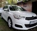 Белый Ситроен С4, объемом двигателя 1.56 л и пробегом 255 тыс. км за 6500 $, фото 2 на Automoto.ua