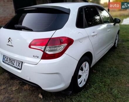 Белый Ситроен С4, объемом двигателя 1.56 л и пробегом 255 тыс. км за 6500 $, фото 1 на Automoto.ua