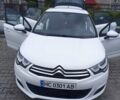 Белый Ситроен С4, объемом двигателя 1.6 л и пробегом 240 тыс. км за 9700 $, фото 2 на Automoto.ua