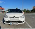 Белый Ситроен С4, объемом двигателя 1.6 л и пробегом 280 тыс. км за 4199 $, фото 1 на Automoto.ua