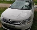 Белый Ситроен С4, объемом двигателя 1.6 л и пробегом 345 тыс. км за 5850 $, фото 1 на Automoto.ua