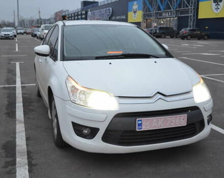 Белый Ситроен С4, объемом двигателя 1.4 л и пробегом 188 тыс. км за 6500 $, фото 1 на Automoto.ua