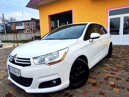 Белый Ситроен С4, объемом двигателя 1.6 л и пробегом 244 тыс. км за 5999 $, фото 1 на Automoto.ua