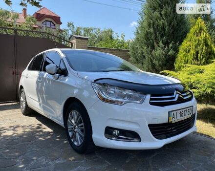 Белый Ситроен С4, объемом двигателя 1.6 л и пробегом 175 тыс. км за 7000 $, фото 1 на Automoto.ua