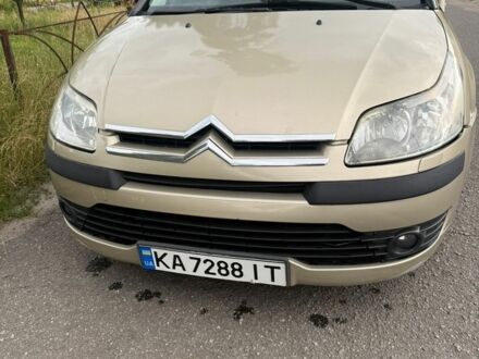 Бежевый Ситроен С4, объемом двигателя 1.59 л и пробегом 330 тыс. км за 3999 $, фото 1 на Automoto.ua