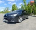 Черный Ситроен С4, объемом двигателя 1.6 л и пробегом 328 тыс. км за 4500 $, фото 1 на Automoto.ua