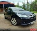 Черный Ситроен С4, объемом двигателя 1.6 л и пробегом 311 тыс. км за 5200 $, фото 1 на Automoto.ua