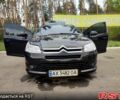 Черный Ситроен С4, объемом двигателя 1.6 л и пробегом 311 тыс. км за 5200 $, фото 1 на Automoto.ua