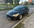 Черный Ситроен С4, объемом двигателя 1.6 л и пробегом 230 тыс. км за 3500 $, фото 1 на Automoto.ua
