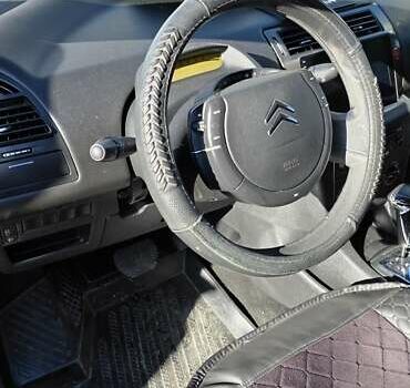 Черный Ситроен С4, объемом двигателя 1.62 л и пробегом 177 тыс. км за 6500 $, фото 4 на Automoto.ua