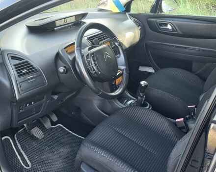 Черный Ситроен С4, объемом двигателя 1.6 л и пробегом 257 тыс. км за 4600 $, фото 9 на Automoto.ua