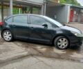 Черный Ситроен С4, объемом двигателя 1.6 л и пробегом 220 тыс. км за 3500 $, фото 1 на Automoto.ua