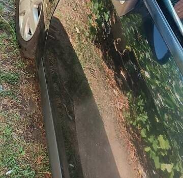 Черный Ситроен С4, объемом двигателя 1.6 л и пробегом 242 тыс. км за 4300 $, фото 7 на Automoto.ua