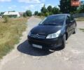 Черный Ситроен С4, объемом двигателя 1.59 л и пробегом 148 тыс. км за 4000 $, фото 1 на Automoto.ua