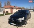 Черный Ситроен С4, объемом двигателя 2 л и пробегом 359 тыс. км за 3900 $, фото 1 на Automoto.ua