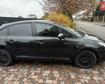 Черный Ситроен С4, объемом двигателя 1.6 л и пробегом 240 тыс. км за 3600 $, фото 4 на Automoto.ua