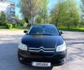 Черный Ситроен С4, объемом двигателя 1.6 л и пробегом 293 тыс. км за 5200 $, фото 1 на Automoto.ua