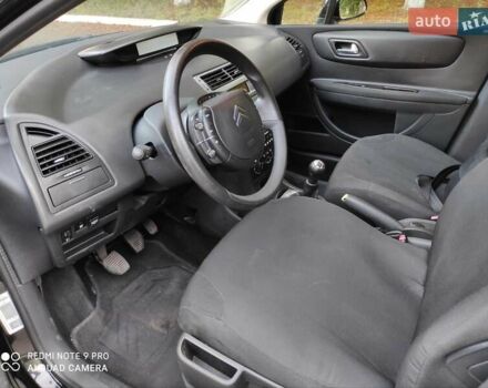 Черный Ситроен С4, объемом двигателя 1.6 л и пробегом 220 тыс. км за 3300 $, фото 9 на Automoto.ua