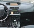 Черный Ситроен С4, объемом двигателя 1.4 л и пробегом 178 тыс. км за 5200 $, фото 1 на Automoto.ua