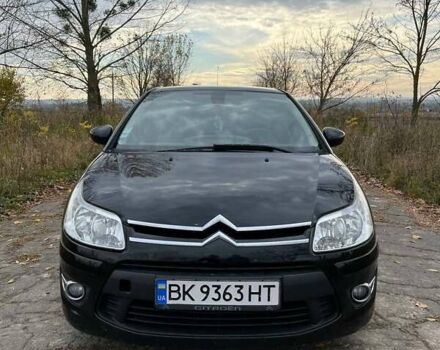 Черный Ситроен С4, объемом двигателя 1.6 л и пробегом 333 тыс. км за 5800 $, фото 1 на Automoto.ua