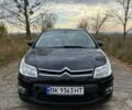 Черный Ситроен С4, объемом двигателя 1.6 л и пробегом 333 тыс. км за 5800 $, фото 1 на Automoto.ua