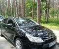 Черный Ситроен С4, объемом двигателя 1.6 л и пробегом 174 тыс. км за 5700 $, фото 1 на Automoto.ua