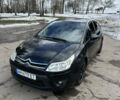 Черный Ситроен С4, объемом двигателя 1.56 л и пробегом 324 тыс. км за 4500 $, фото 1 на Automoto.ua