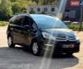 Черный Ситроен С4, объемом двигателя 1.6 л и пробегом 310 тыс. км за 5840 $, фото 2 на Automoto.ua