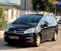 Черный Ситроен С4, объемом двигателя 1.6 л и пробегом 310 тыс. км за 5840 $, фото 1 на Automoto.ua