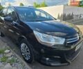 Черный Ситроен С4, объемом двигателя 1.6 л и пробегом 153 тыс. км за 7555 $, фото 1 на Automoto.ua