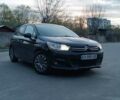 Черный Ситроен С4, объемом двигателя 1.6 л и пробегом 205 тыс. км за 8200 $, фото 1 на Automoto.ua