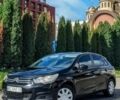 Черный Ситроен С4, объемом двигателя 1.59 л и пробегом 290 тыс. км за 4500 $, фото 1 на Automoto.ua