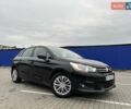 Черный Ситроен С4, объемом двигателя 1.56 л и пробегом 228 тыс. км за 7800 $, фото 1 на Automoto.ua