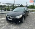 Чорний Сітроен С4, об'ємом двигуна 1.6 л та пробігом 143 тис. км за 7600 $, фото 1 на Automoto.ua