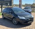 Черный Ситроен С4, объемом двигателя 1.6 л и пробегом 205 тыс. км за 5500 $, фото 1 на Automoto.ua